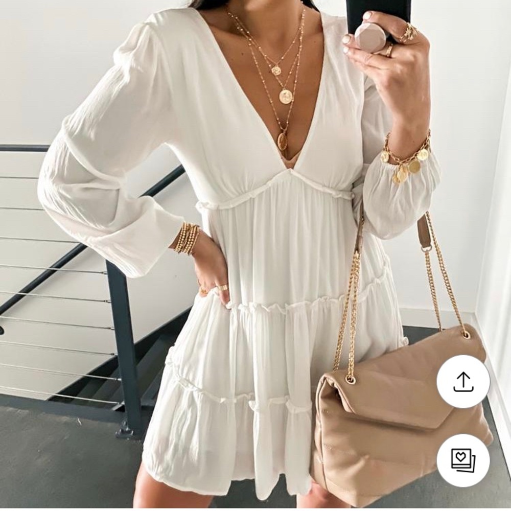 Forever 21 mini dress featuring ruffle trim, tiered construction, V-neckline